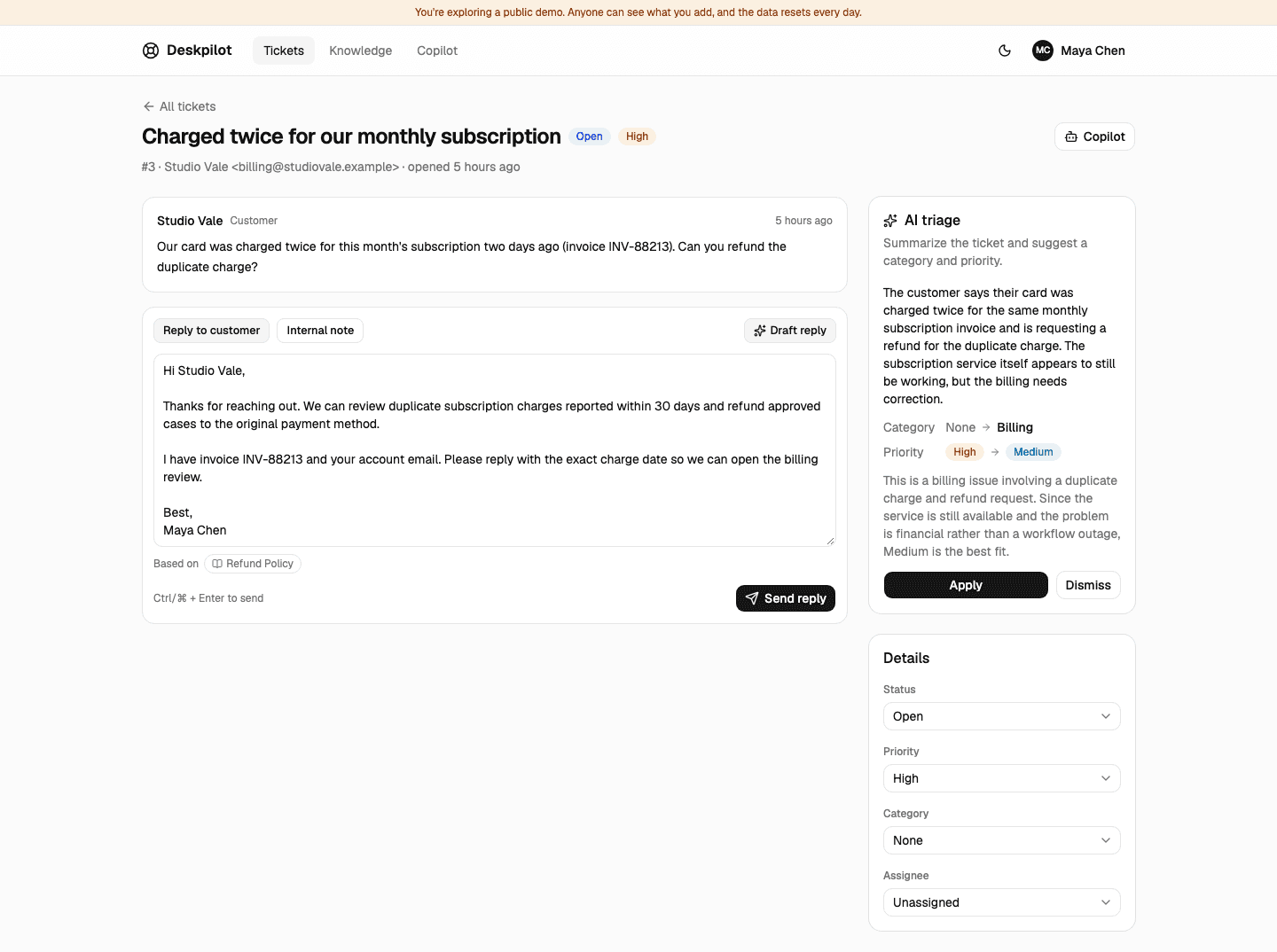 A ticket about a duplicate subscription charge. The AI triage panel suggests the Billing category and Medium priority, and the drafted reply is marked as based on the Refund Policy.